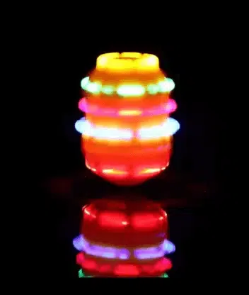 Uttam Toys Avengers Spinning Top Toy with Music and Flashing Lights - Multicolour